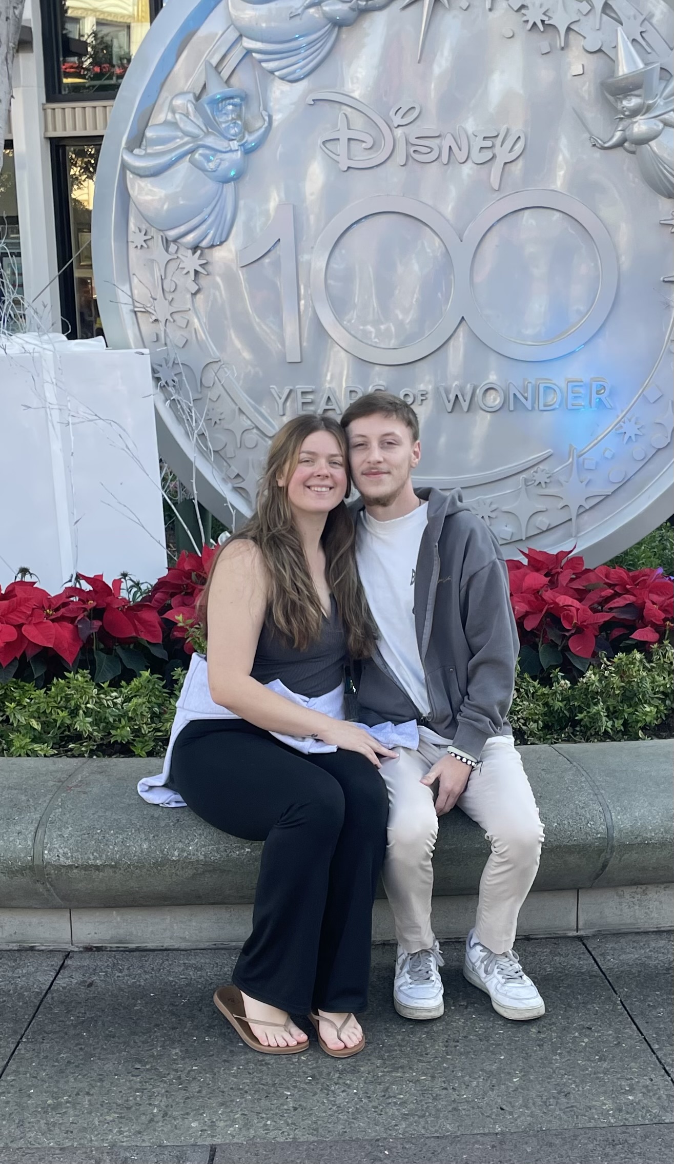 Tristen and Renee at Disney World, smiling together in front of the castle